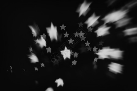 空间中的黑白星和白星辉光航天风格效应流星星星情绪粒子背景艺术背景图片