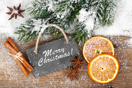 气色不错带有板板板的圣诞装饰品 木制背景乡村橙子肉桂木头木板香气季节星星石板食物背景