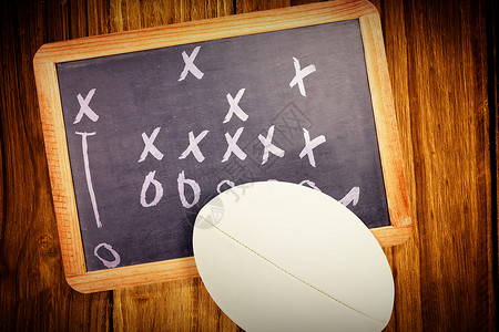 橄榄球闭合的复合图像运动框架箭头课堂教育黑板木板活动体育足球背景图片