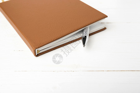 笔和笔空白笔记笔记本记事本螺旋日记教育备忘录商业办公室背景图片