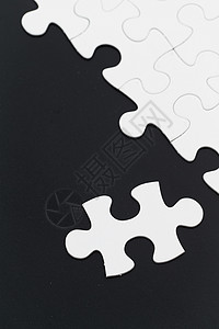 Jigsaw 拼图背景成功游戏解决方案概念玩具挑战黑色商业广告团队背景图片