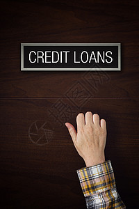 手敲着信用贷款的门办公室客户债务消费信用银行业信贷保险金融贷款背景图片