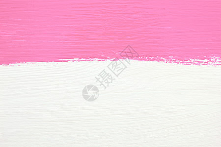 粉色涂料在白木本面上背景图片