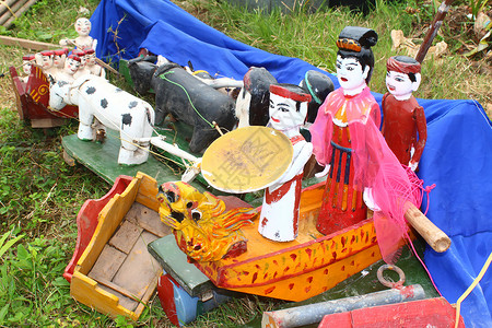 水木偶戏服文化展示游客工艺传统玩具假期表演雕刻背景图片