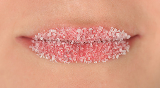 水晶糖糖唇水晶嘴唇皮肤宏观白色背景