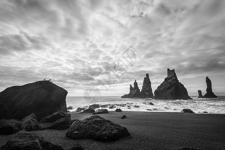人生有梦各自精彩冰岛的沿海景观远足火山气候天空远景海滩旅行孤独黑与白风暴背景