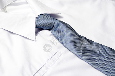 向下降落男士白衬衫 带蓝色领带男性男士商务职业商业壁橱人士服装店铺白色背景