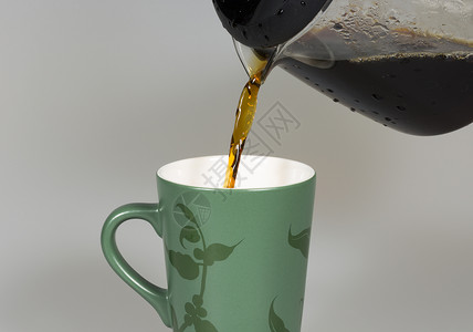 Coffey 游进杯中杯子绿色咖啡宏观背景图片
