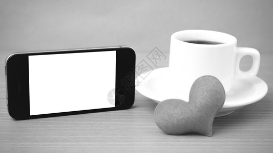 咖啡杯 电话和心脏红色桌子杯子办公室咖啡白色手机背景图片