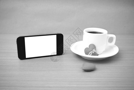 咖啡杯 电话和心脏白色红色咖啡桌子杯子手机办公室背景图片