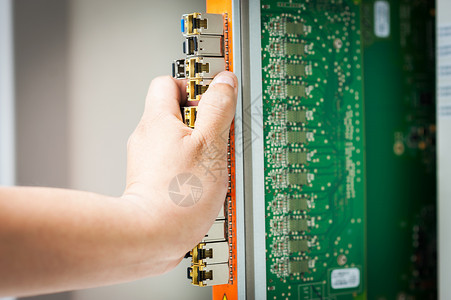 数据中心室的固定网络开关技术服务器技术员电缆交换电话维修背景图片