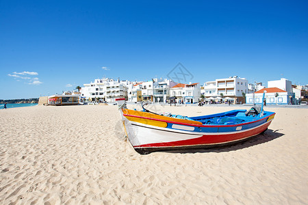 葡萄牙海滩的渔船背景图片
