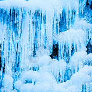 蓝色水晶冰瀑布蓝色冰柱冻瀑布玻璃水晶冻结洞穴季节岩石液体窗户天气冰川背景