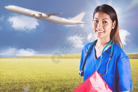 以听诊器看镜头的亚洲护士综合图象蓝色计算机女士飞行红色相机航空旅行微笑场地背景图片