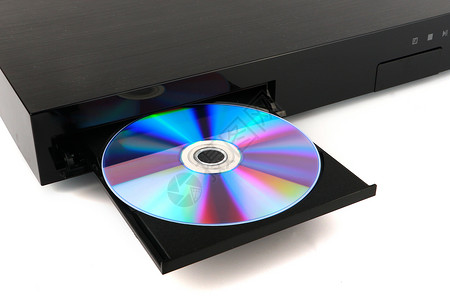 dvd播放器DVD CD 磁盘插入到白背景 特写 孤立的 dvd 播放器玩家白色笔记本音乐电脑软件视频贮存技术数据背景