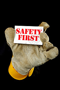 安全第一安全首先概念商业手套危险程序预防工作服协议卡片警告注意力背景图片