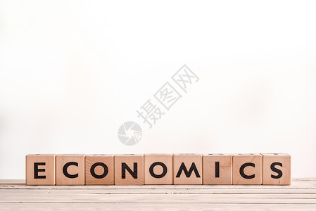 书桌上的经济学标志背景