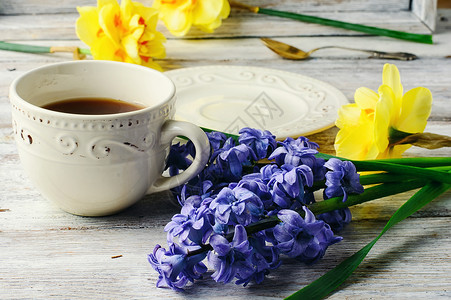 水仙茶素材茶和鲜花茶碗花瓣叶子早餐杯子饮料香气植物芳香水仙背景