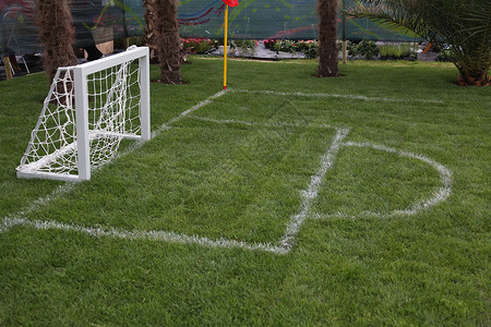 手球球门足球目标球门惩罚体育场足球场娱乐手球绳索绿色运动沥青背景