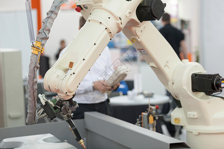 机器人臂制造业自动化活动机械臂控制焊接操作工具速度指挥背景图片