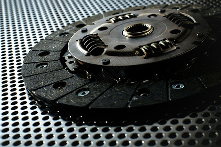 金属表面的汽车离合器车辆产品篮子磁盘盘子工厂引擎服务发动机维修背景图片