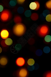 七彩散景灯辉光绿色闪光金子假期黄色派对红色背景圆圈高清图片
