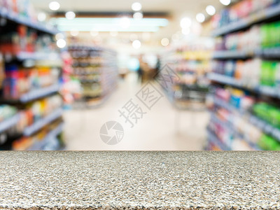 模糊超市前的大理石空桌建筑物商品柜台广告部门市场商业架子背景美食背景图片