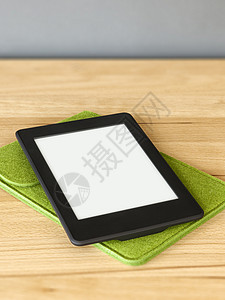 木制桌上的电子书阅读器电子技术空白桌子药片木头互联网白色阅读屏幕背景图片