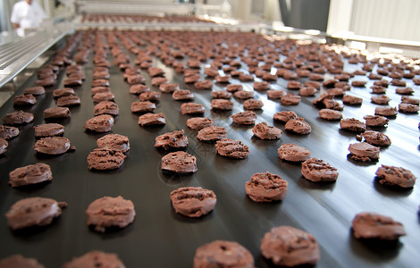 蛋糕工厂饼干烘烤机工作自动化工厂加工工具面包盘子产品生产制造业背景