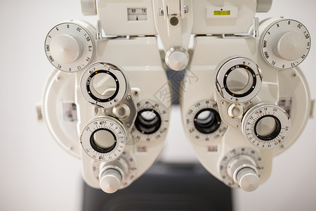 光辉图表光学测试双目医疗医生乐器诊所镜片验光机背景图片