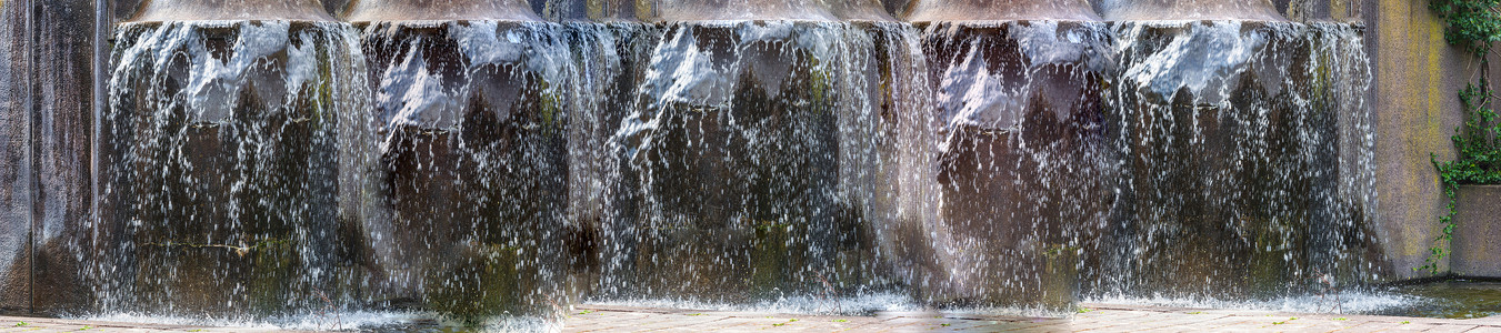 人工设计的瀑布 喷泉和喷泉背景图片