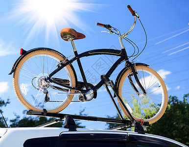 车架子自行车运输在汽车的屋顶的自行车车辆假期机器驾驶交通载体娱乐金属旅游车轮背景