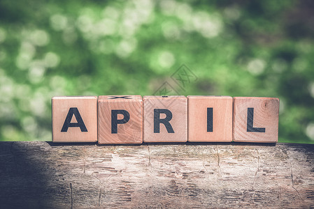复古星期标志4月在绿花园的春天标志背景