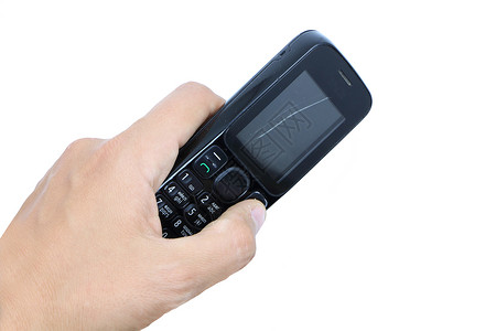手握旧式破旧移动电话屏幕尽头手机回收黑色背景图片