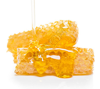 蜜蜂蜂窝荒野黄色蜂蜡液体金子细胞白色工作室食物药品背景图片