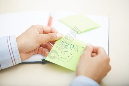 谢谢你的粘合音绿色办公室文书女性人士笔记水平商业感恩不干胶背景图片