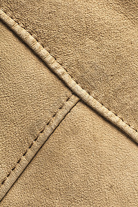 天然绒面革的质地宏观皮肤接缝羊皮材料褐色高清图片
