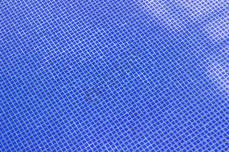 游泳池的蓝砖可以作为背景使用地面水池瓷砖装饰墙壁地砖风格泳池蓝色背景图片