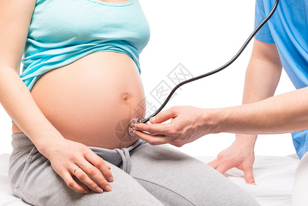 孕妇在妇科医生接诊时 腹部闭合高清图片