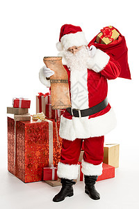 圣诞老人 带着一堆圣诞礼物白色红色庆典节日背景图片