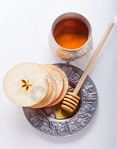 给的蜂蜜和苹果想法水果活动桌子静物水平健康饮食文化饮食甜食背景图片