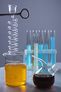 实验室容器中多色液体的处理气泡环境煤气试验生物学家化合物硫酸铜吸管产品化学背景图片
