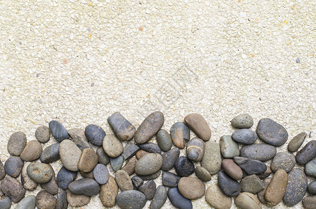 砾石背景上的小石头卵石黑色岩石灰色碎石白色地面背景图片