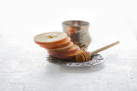 给的蜂蜜和苹果健康饮食概念饮食节日静物水平盘子摄影文化活动背景图片