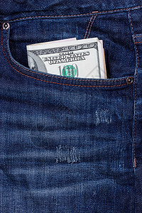牛仔裤口袋里的美元购物财富顾客商业牛仔布银行裤子支付现金材料背景