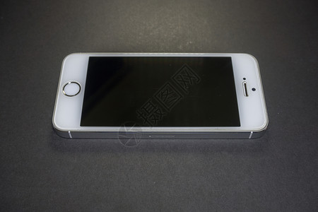 现代移动电话白色电话黑色按钮手机展示背景图片