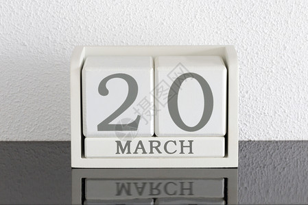 2月2日3月20日和2月目前白区块日历日期框架死亡假期历史节日派对白色会议黑色反射背景