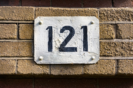 编号 121房子手绘指示牌序数号码石工门牌砖块地址长方形背景