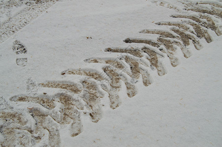 畦抽象冬季背景上从汽车轮胎 trea 的轨道的雪特写运输卡车状况后卫天气季节烙印版画橡皮沥青背景