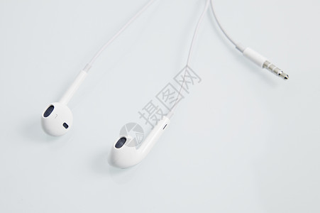 白耳听器白色扬声器宏观团队工作室手机立体声声学电子产品耳朵背景图片